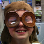 Child at Leatherneck Museum at Miramar Naval Air Station dressed as old time pilot