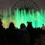 Silhouette crowd watching fountains